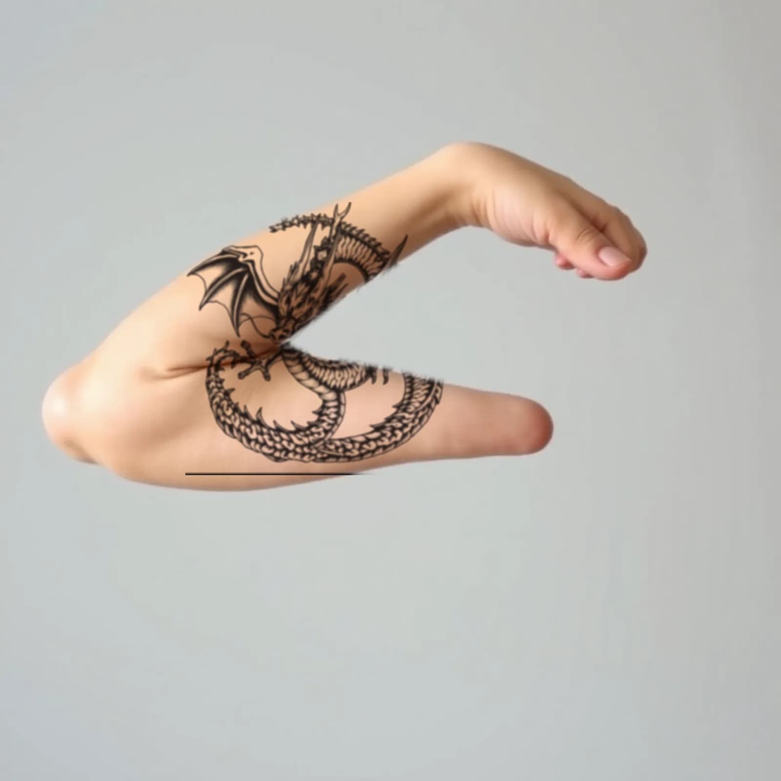 Dragon Cover Up Design tattoo shown on the upper arm