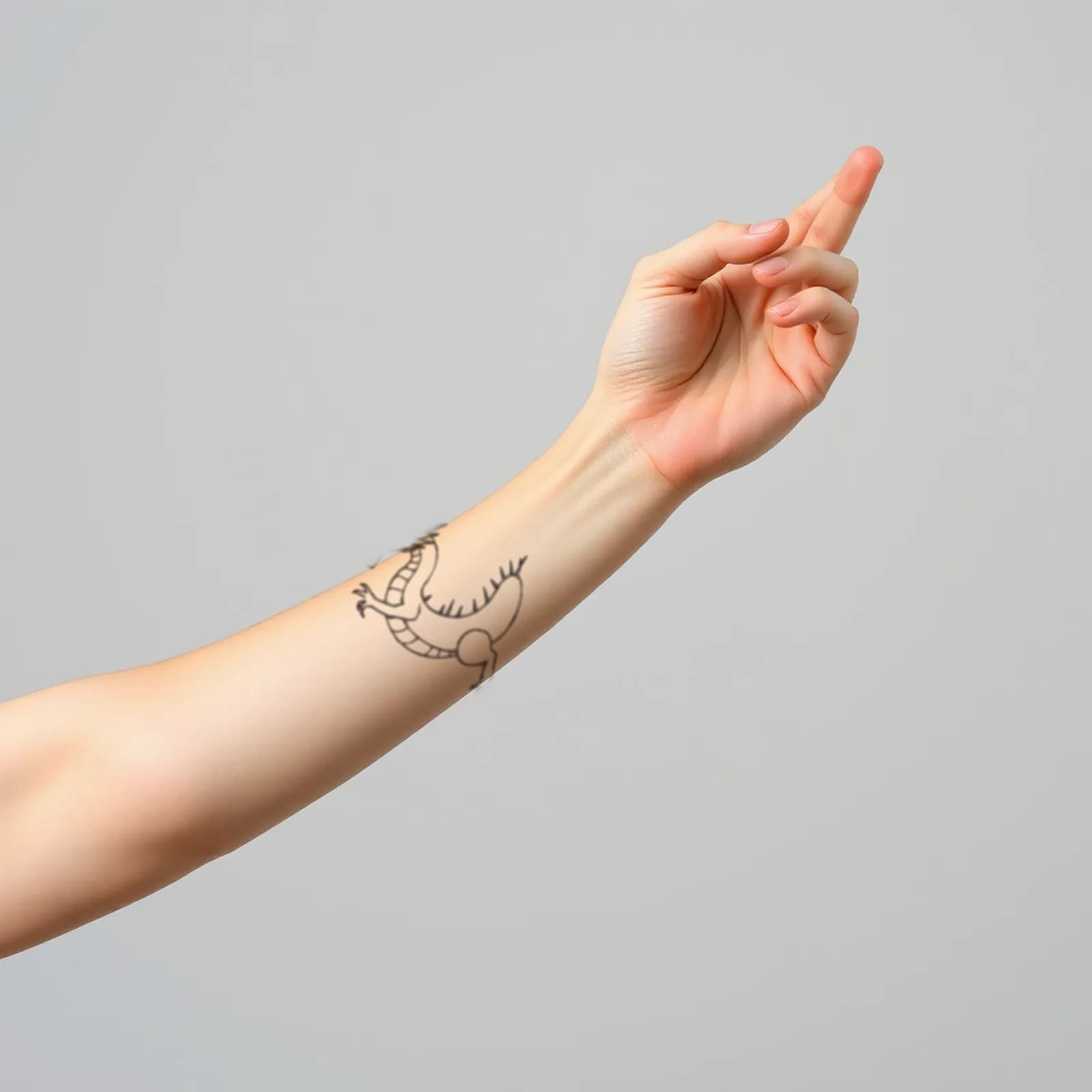 Micro Dragon Wrist tattoo shown on the wrist